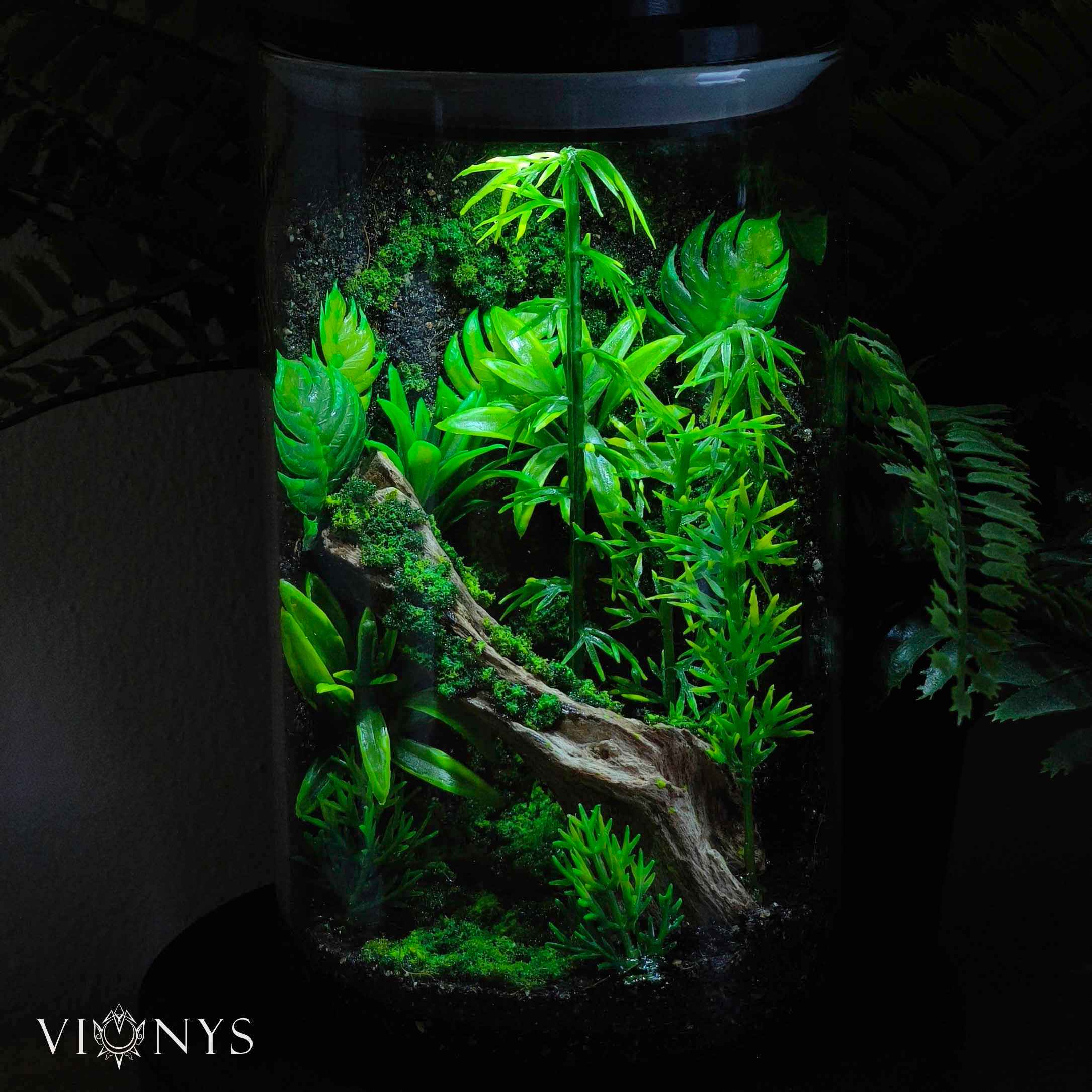 Fantasy LED lamp in white variant with bamboo and vegetation inside.